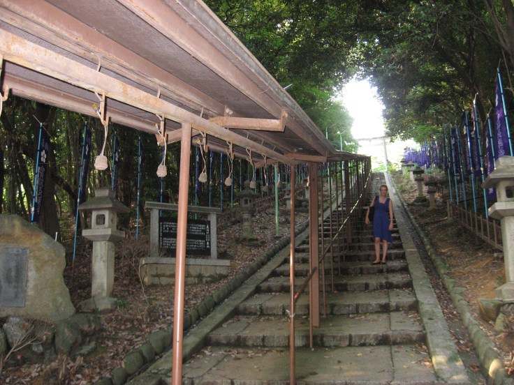 the stairs leading to a temple in Japan