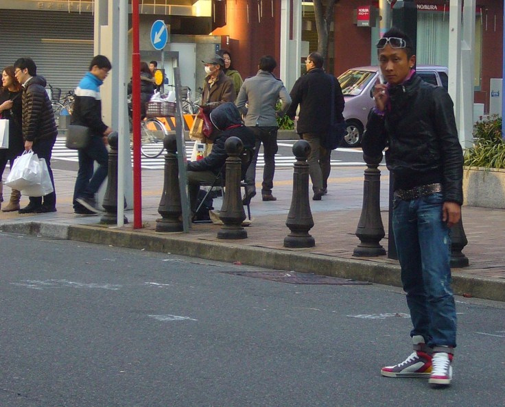 Pimped out car owner acting casual