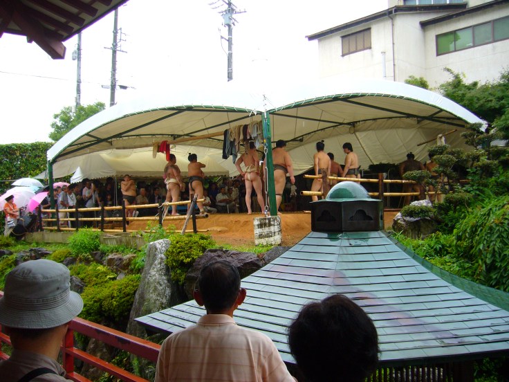 Watching sumo training Watching sumo training