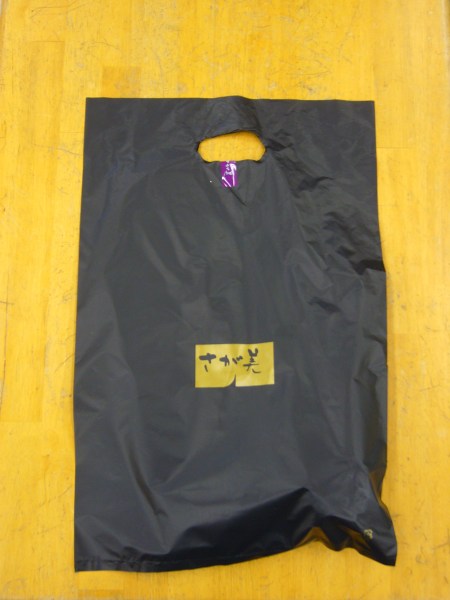 taping the bag for convenience in Japan